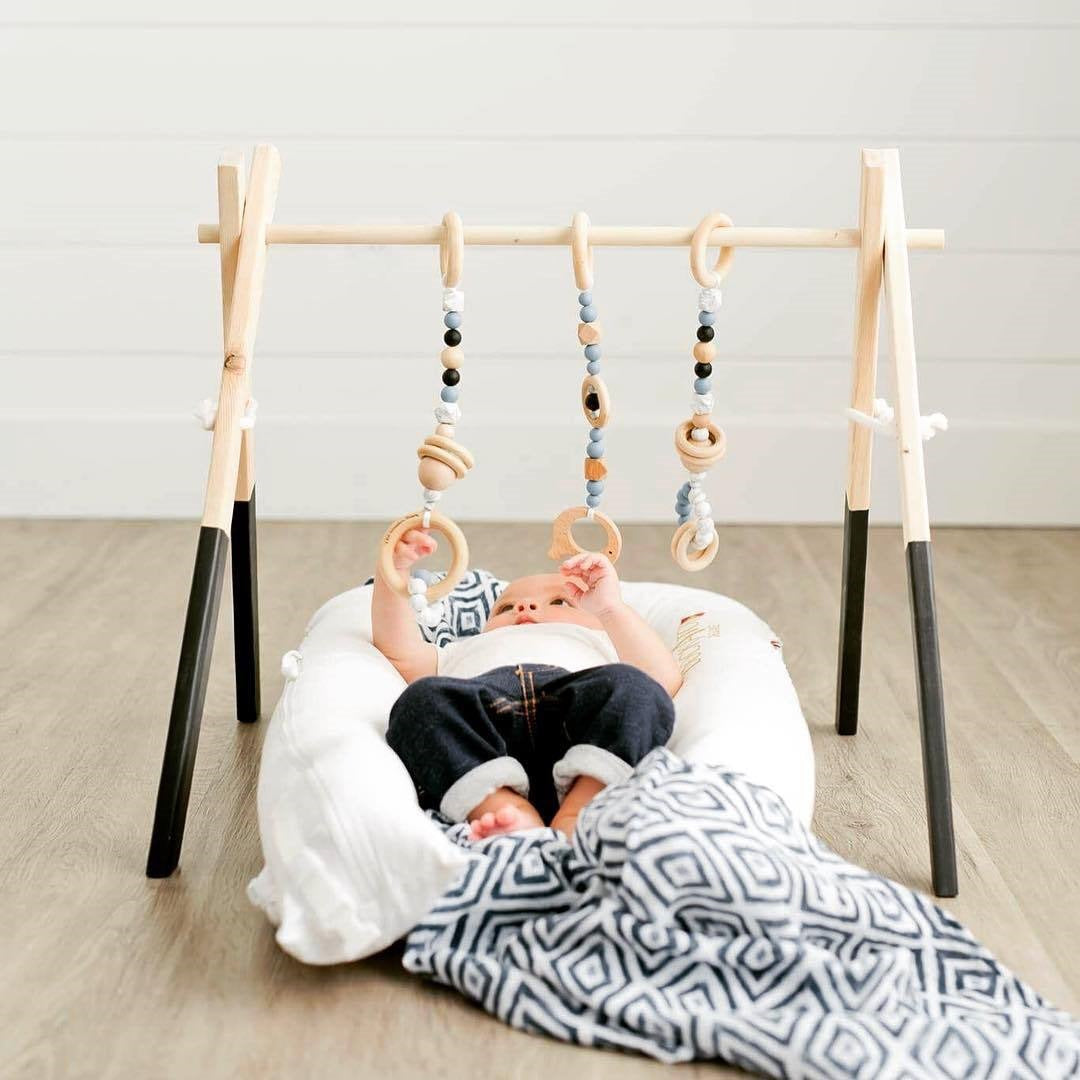 Elegant Wooden Infant Play Gym | Safe & Stimulating for 0-6 Months
