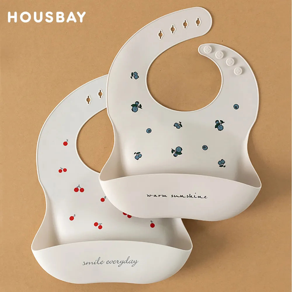 HOUSBAY silicone baby bibs in white, one with red cherries and &